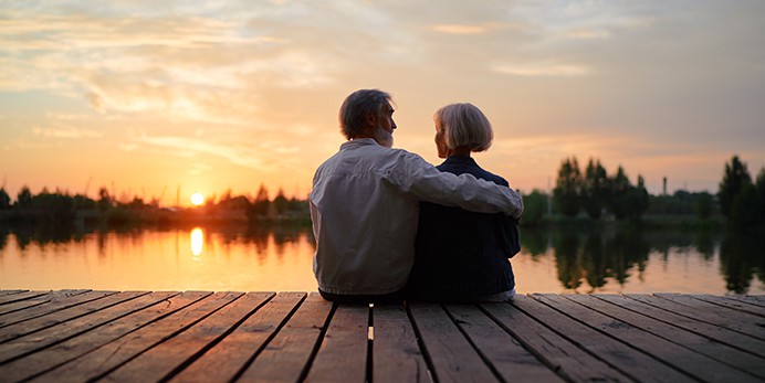 couple sitting on dock