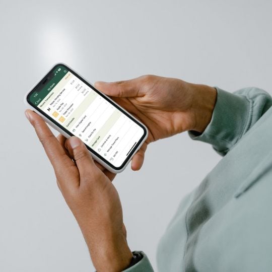 person using card controls on their phone