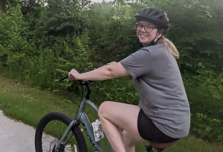 Photo of a Clean Energy CU member riding their new Townie E-Bike