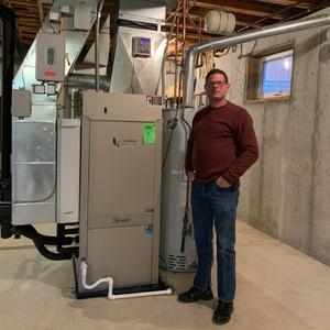 man standing in front of geothermal