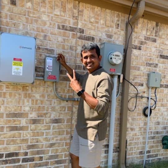 man in front of electric meter box